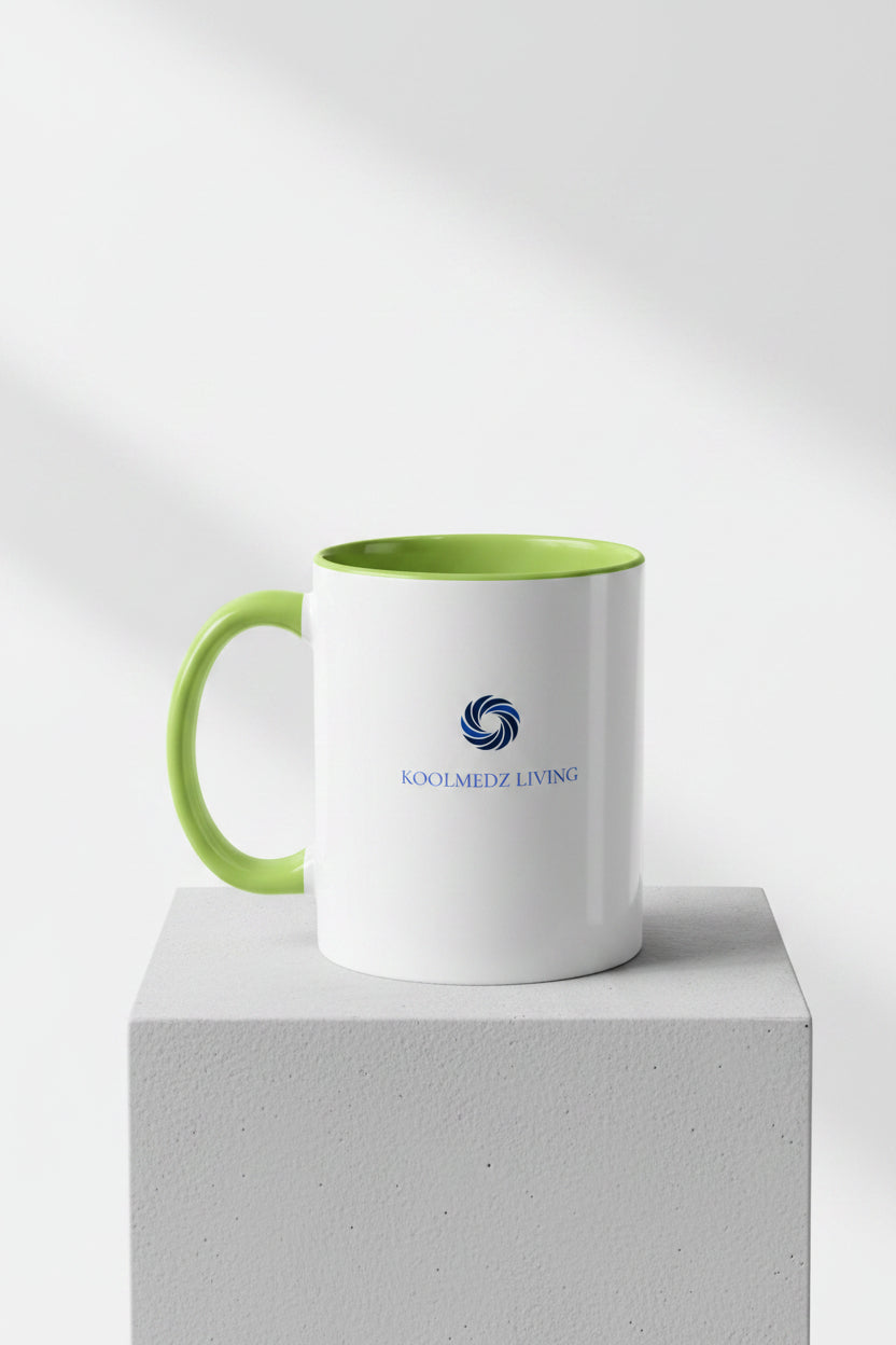 Ceramic accent mug with green rim and handle, white body, blue logo