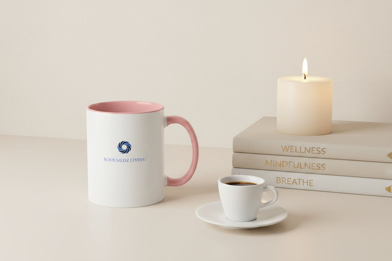 Ceramic mug with pink interior and handle, white body, blue KoolMedz Living logo