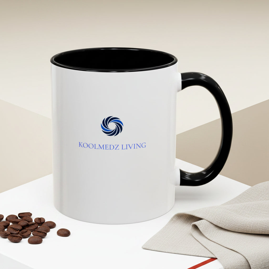 Ceramic mug with black rim and handle, white body, blue KoolMedz Living logo