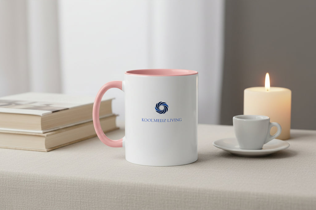 Ceramic mug with pink rim and handle, white body, blue KoolMedz Living logo