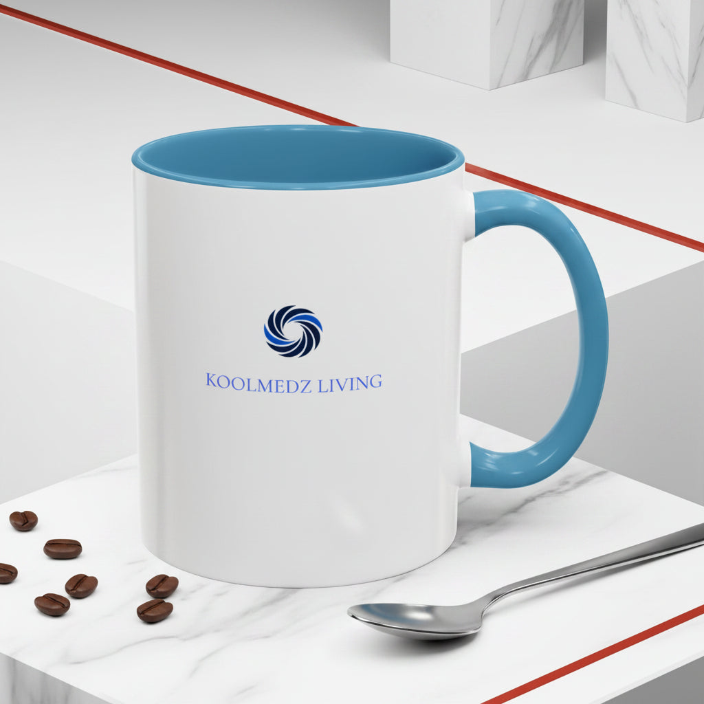 Ceramic mug with light blue interior and handle, white body, KoolMedz Living logo.