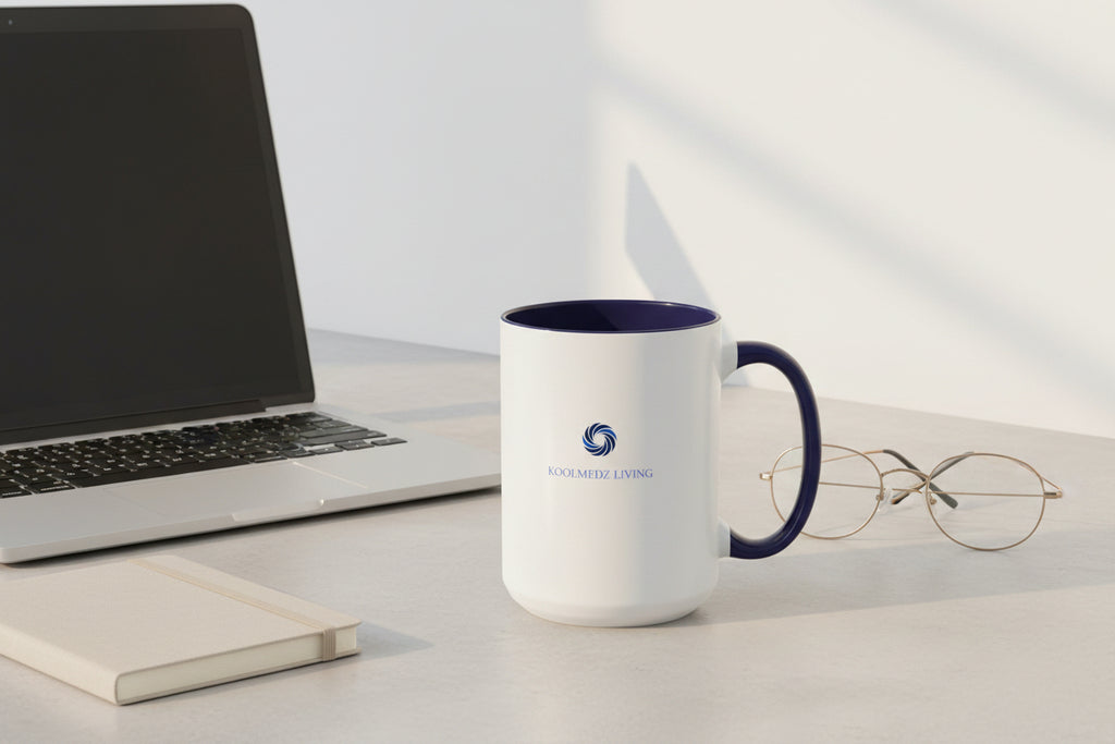 Ceramic mug with blue interior and handle, white body, Living logo on front.