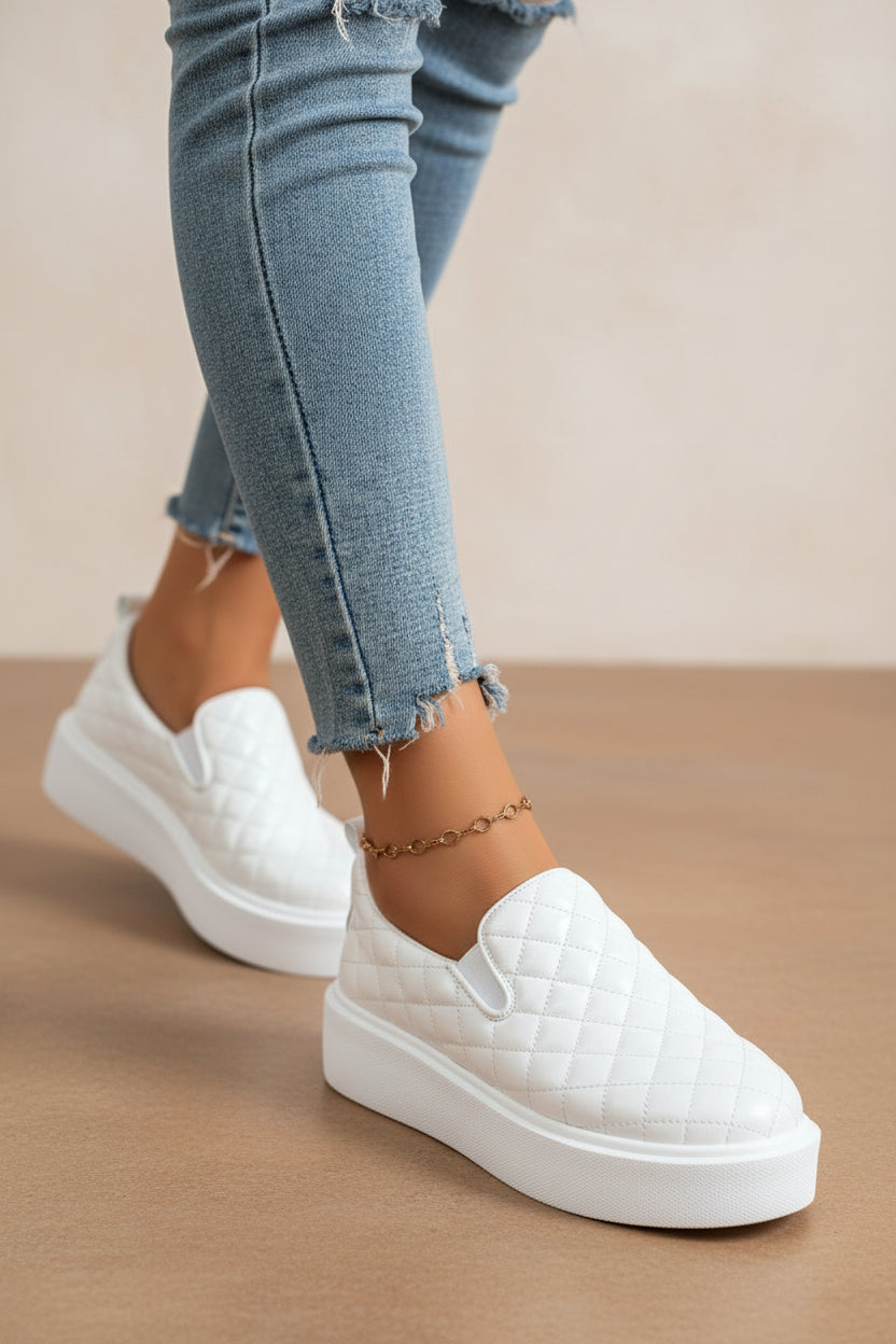 White quilted slip-on platform sneaker with white sole and rounded toe