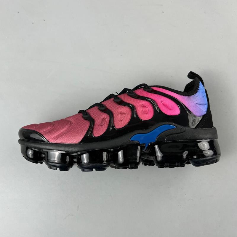 Pink and black unisex sculpted-sole sneakers with blue accents and air-cushion sole pods.