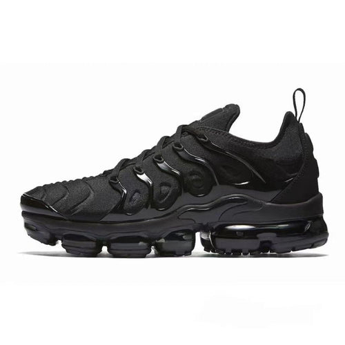 Black unisex sculpted-sole sneakers with wavy overlays and clear air-cushion pods.