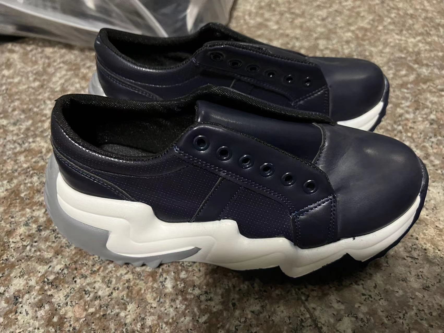 Women’s sculpted platform sneakers, black with white chunky sole