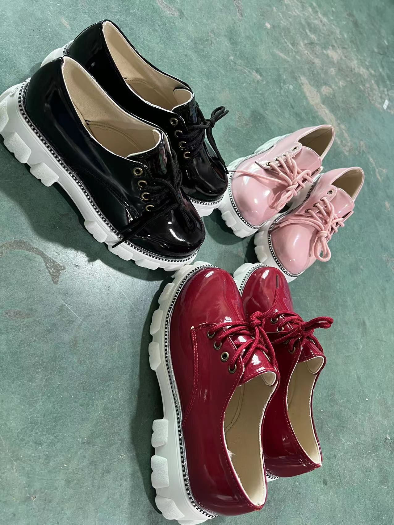 Set of glossy platform lace-up shoes: black, blush pink, and burgundy with white lug soles