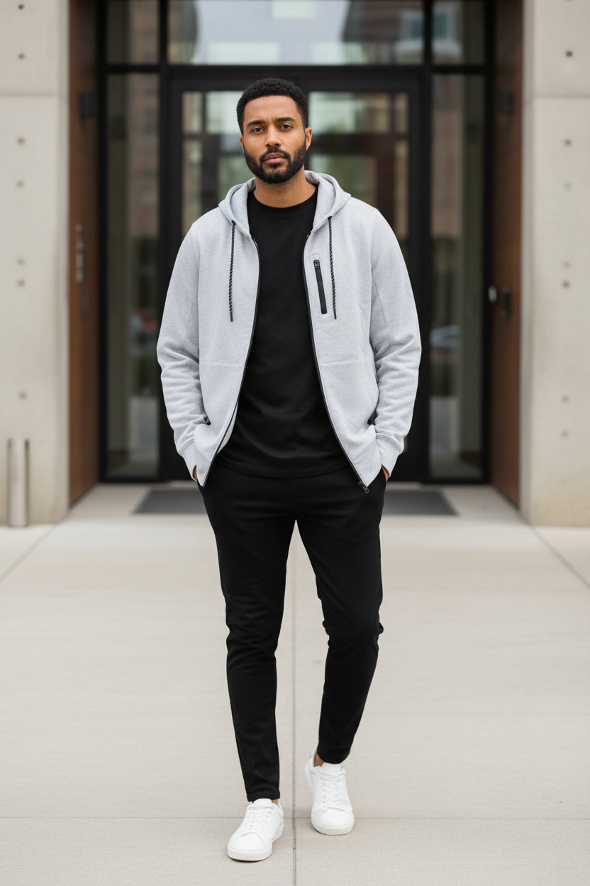 Men's light gray zip-up hooded jacket with front zipper and side hanging drawstrings