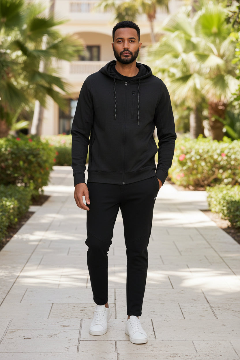 Men's black zip-up hooded jacket with front zipper and hanging drawstrings