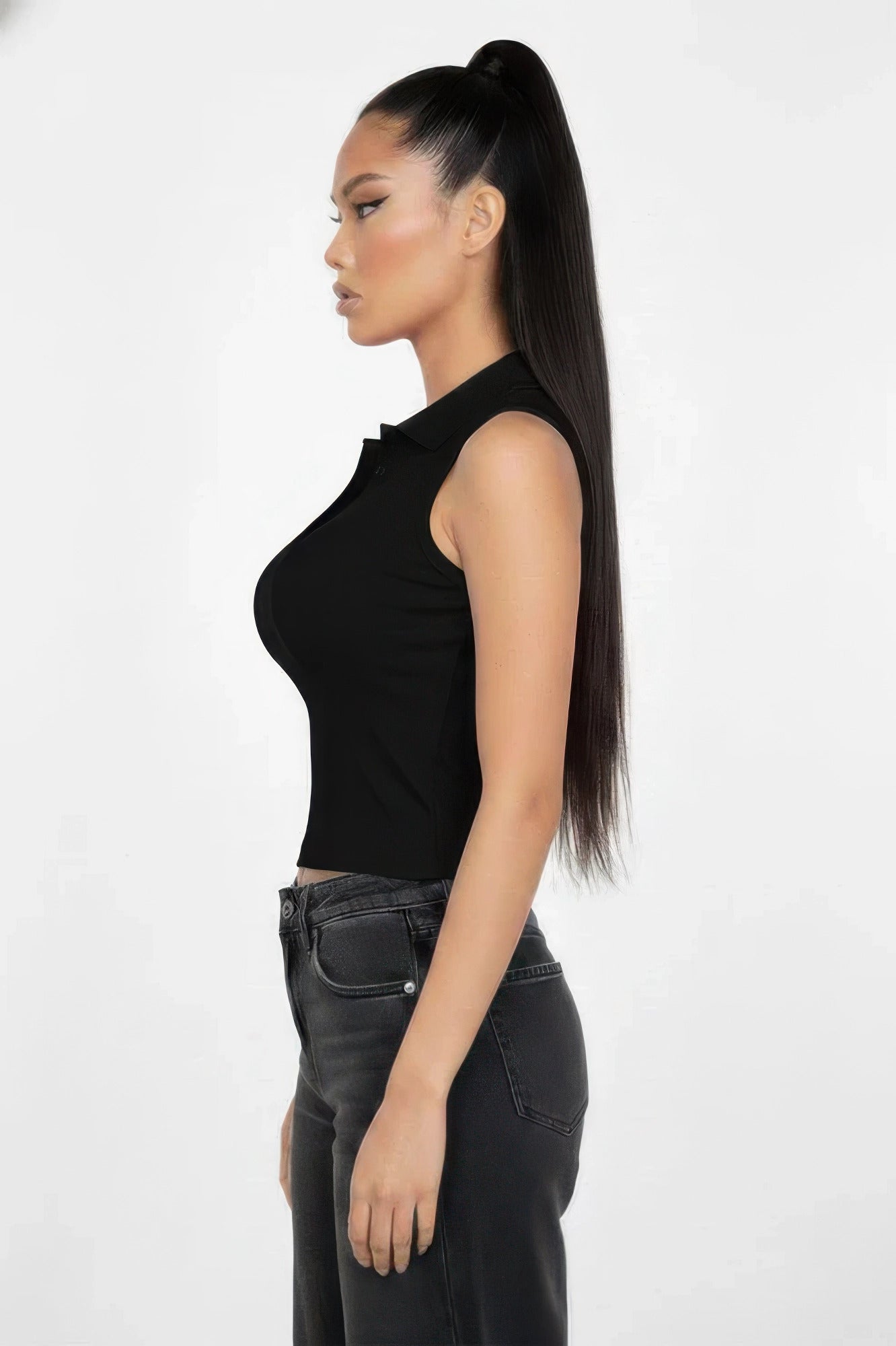 Black sleeveless polo crop top, side view, with collar and placket
