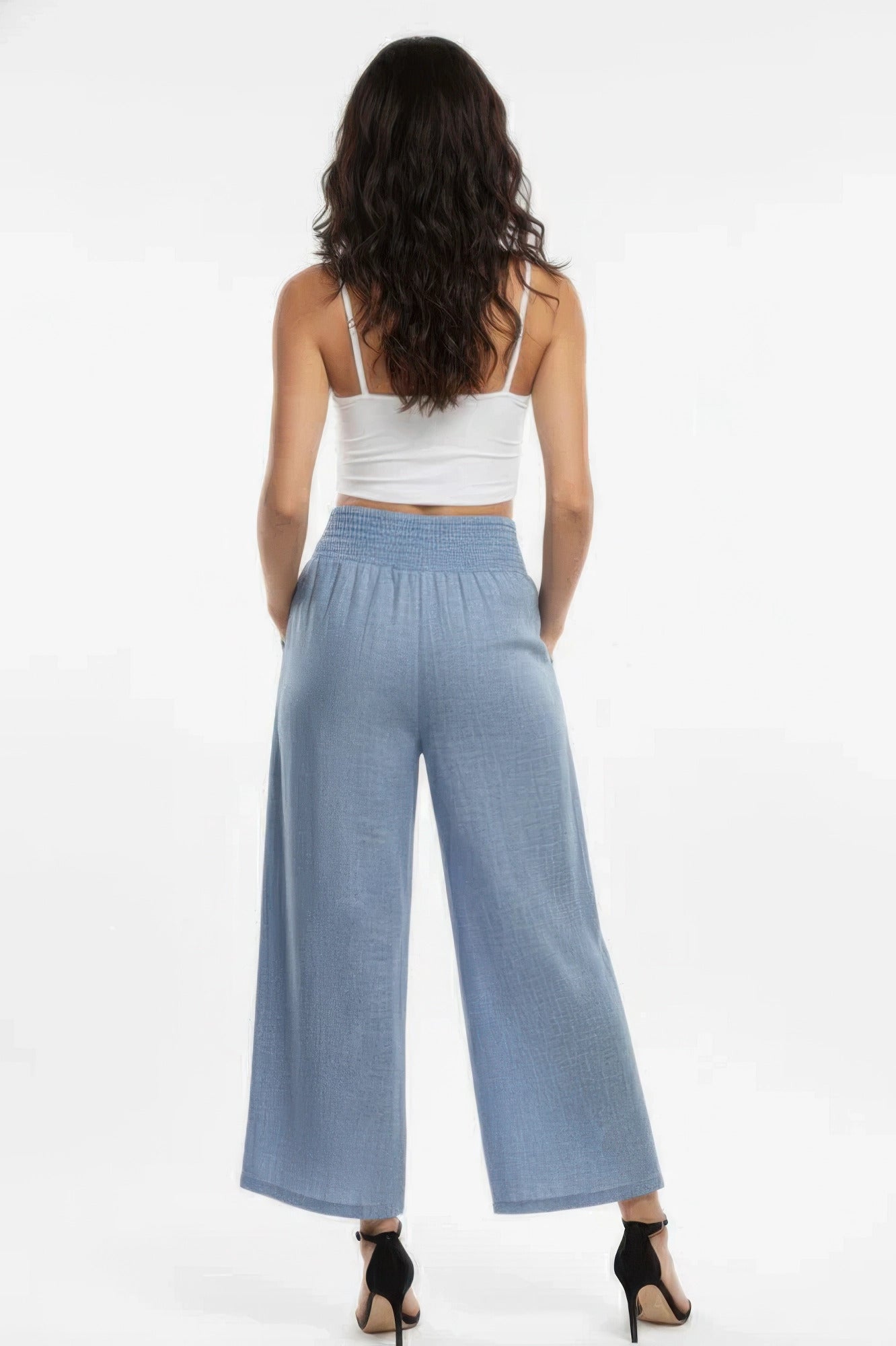 Back view of high-waisted wide-leg lounge pants in slate blue with elastic waist
