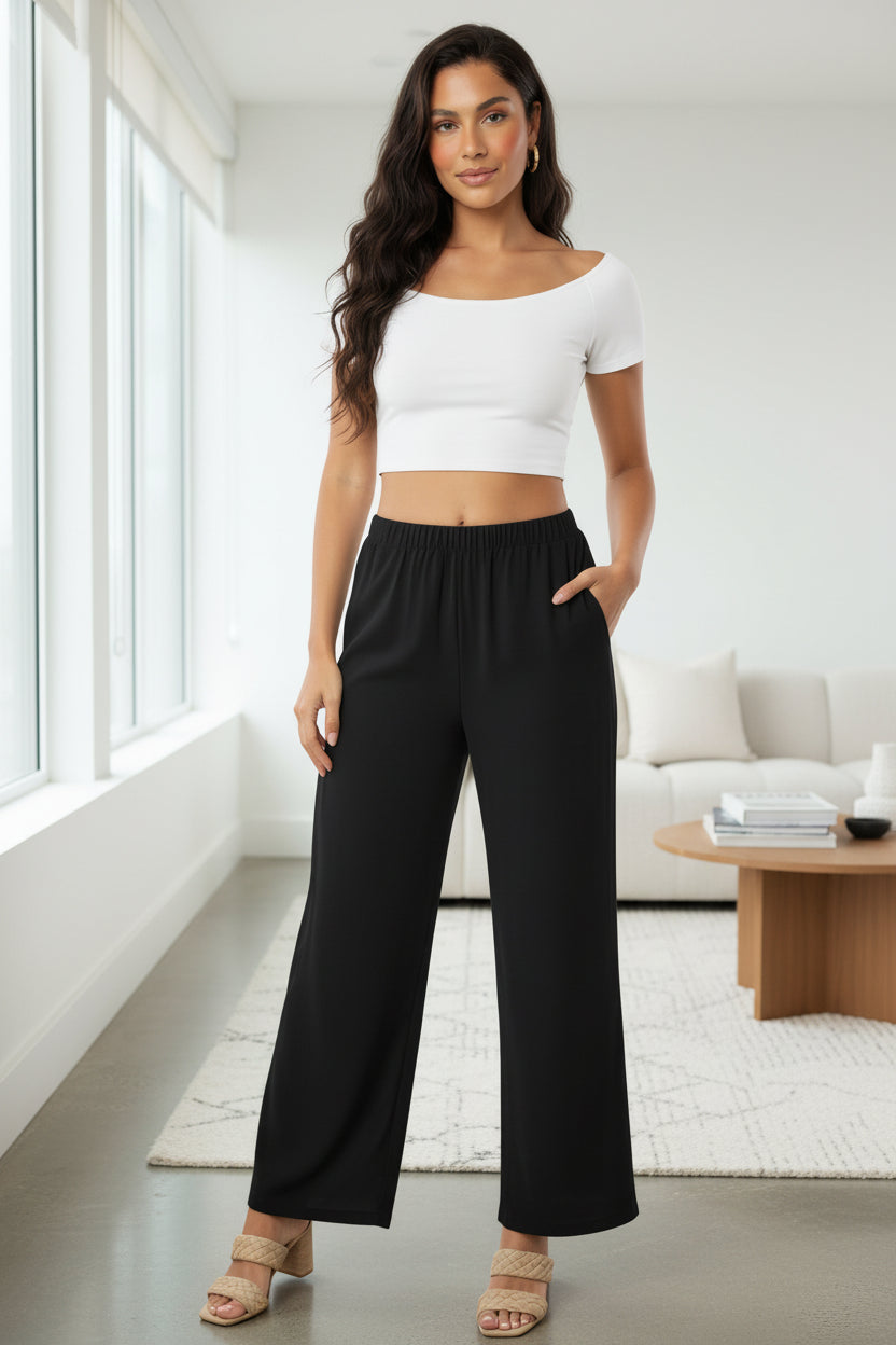 Black wide-leg cotton pants with elastic waist and side pockets