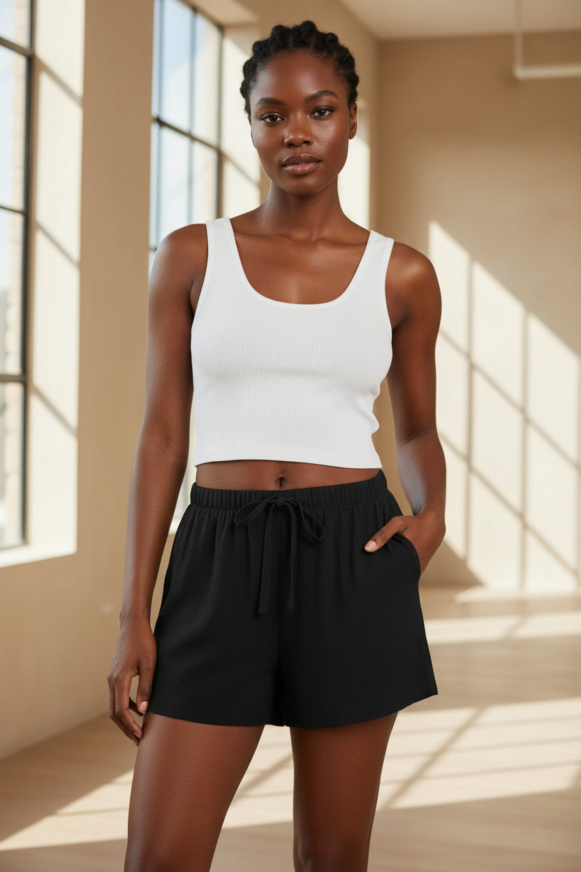 Cotton comfort shorts in black with elastic waistband and drawstring ties