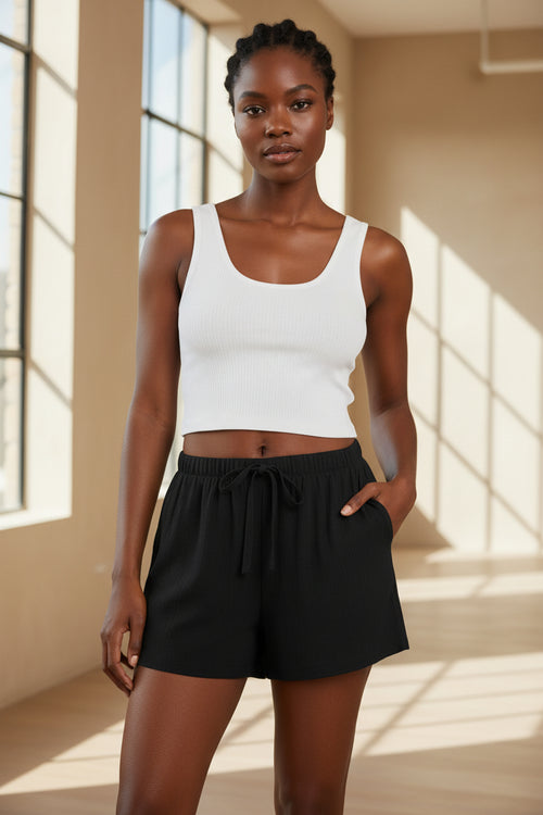 Cotton comfort shorts in black with elastic waistband and drawstring ties