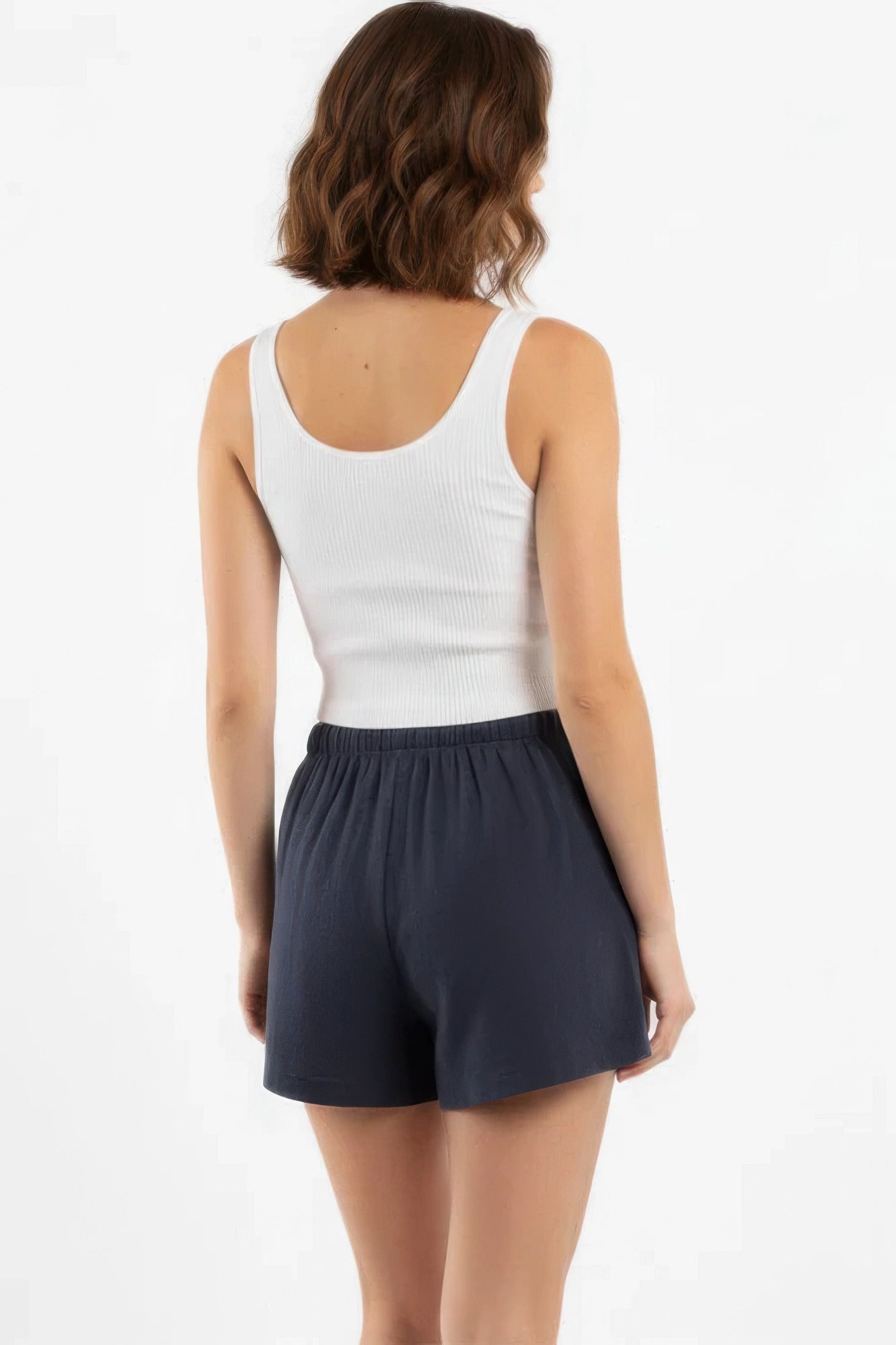 Cotton comfort shorts in navy shown from the back with elastic waistband
