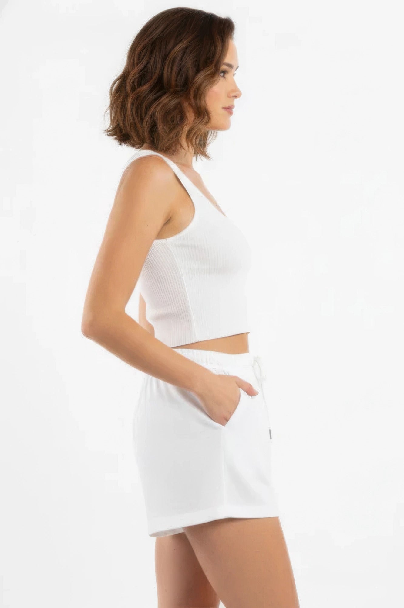 Off-white cotton comfort shorts with elastic waistband and relaxed leg opening