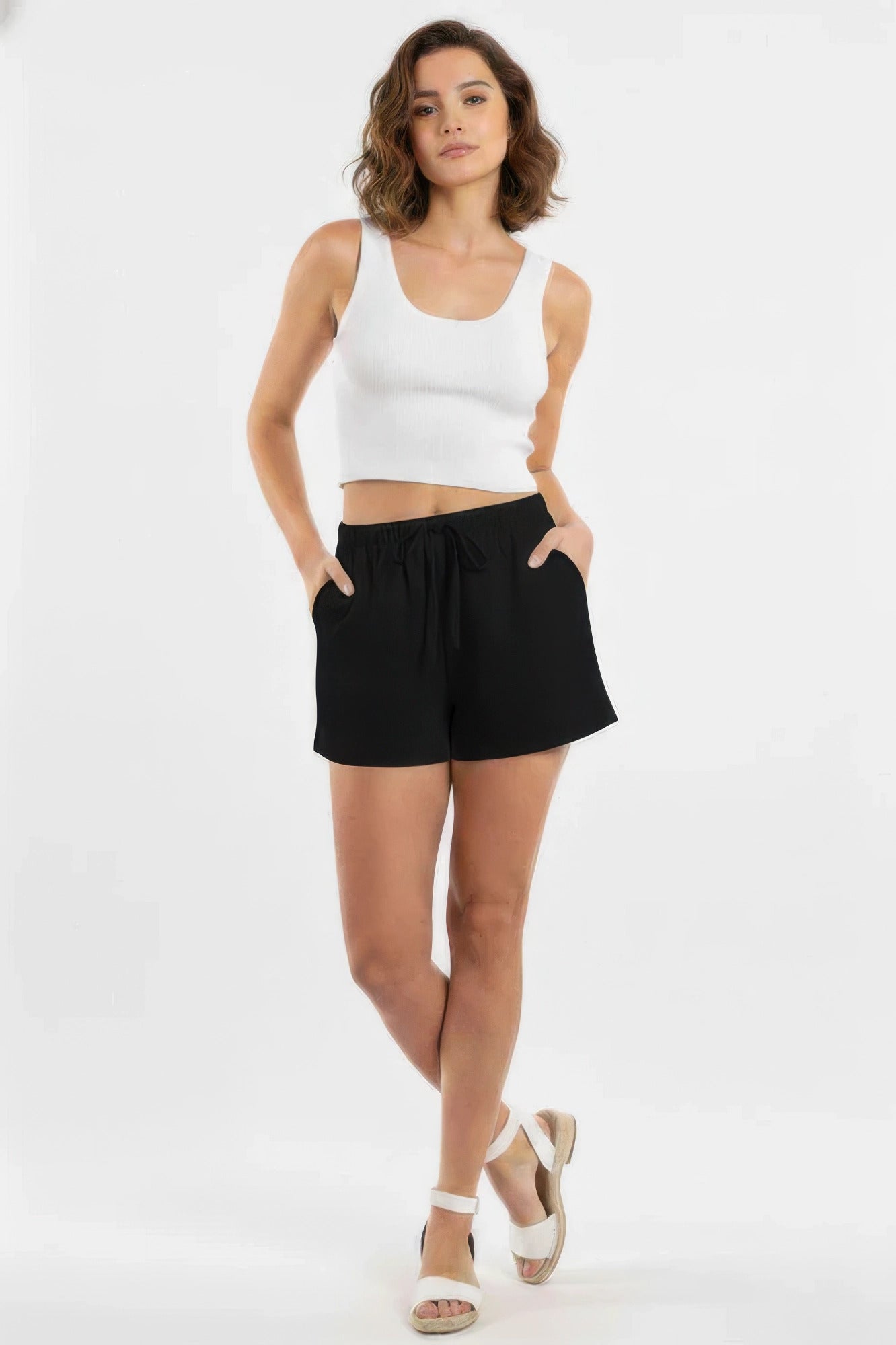 Cotton comfort shorts in black with elastic waistband and drawstring ties