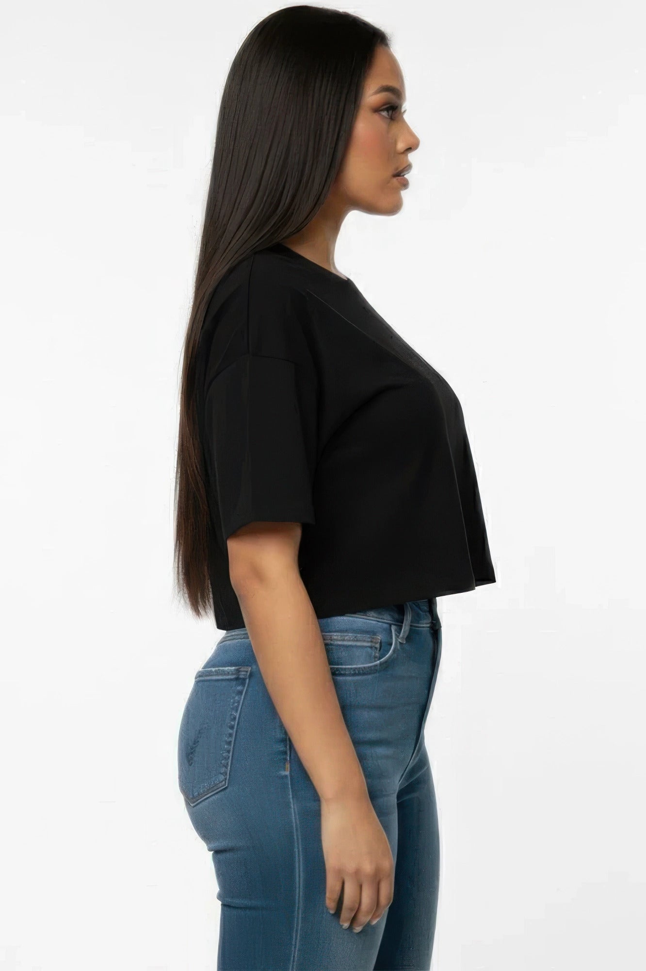 Women's black cropped T-shirt, side view with short sleeves and round neckline