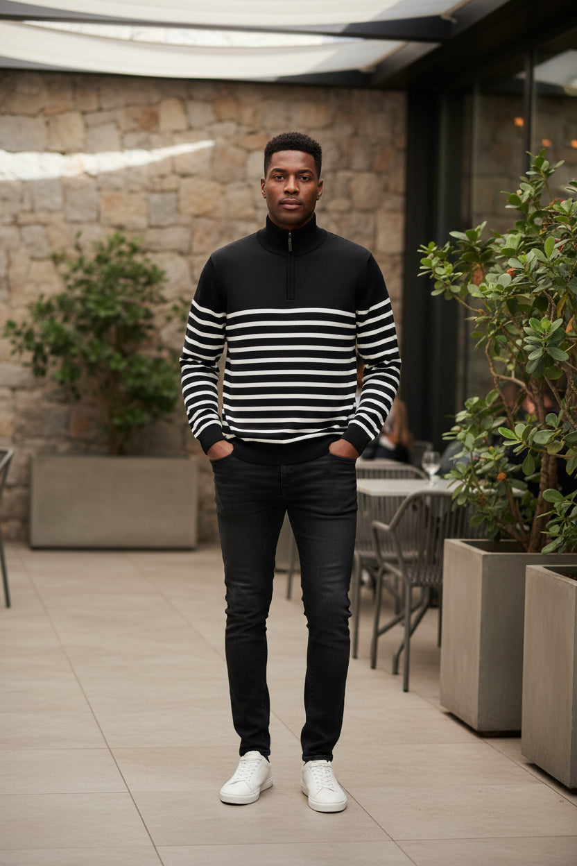 Men's black quarter-zip pullover sweater jacket with white striped bands across chest
