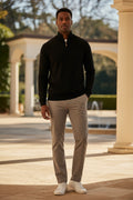 Men's knit quarter-zip sweater in black with stand collar and half-zip placket