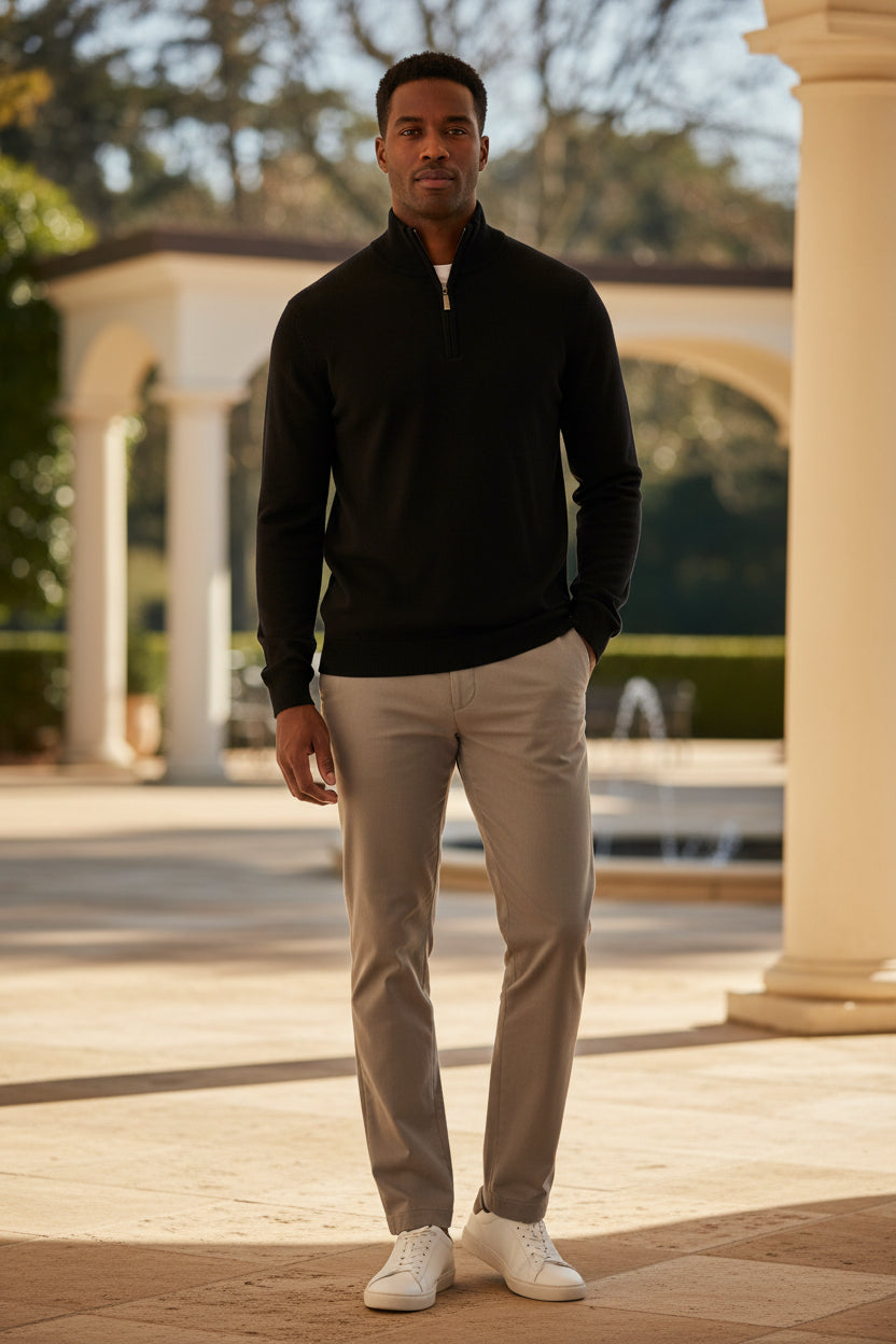 Men's knit quarter-zip sweater in black with stand collar and half-zip placket