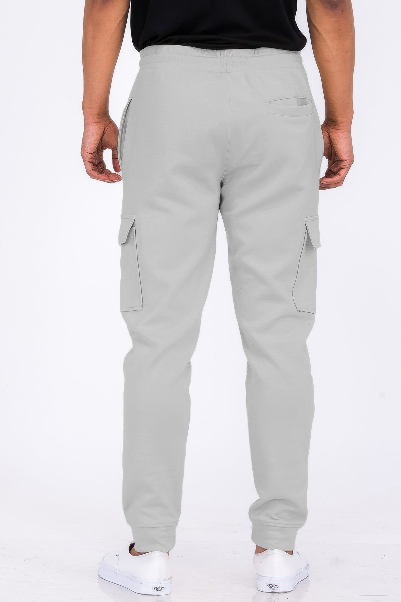Men's cargo jogger sweatpants in light gray with cargo pockets and tapered jogger cuffs.