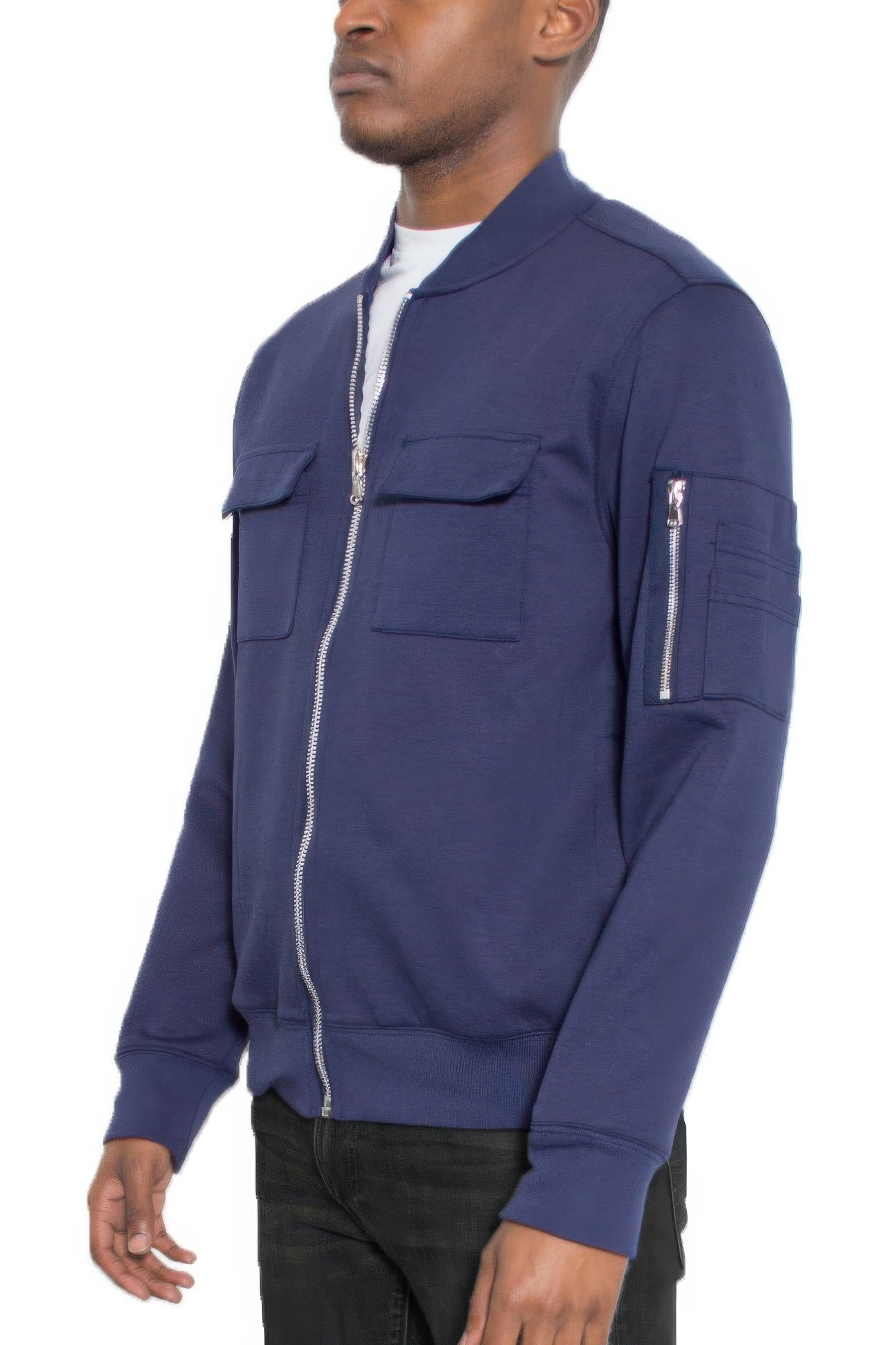 Men's navy cotton zip-front jacket, side view with zip pocket detail on sleeve