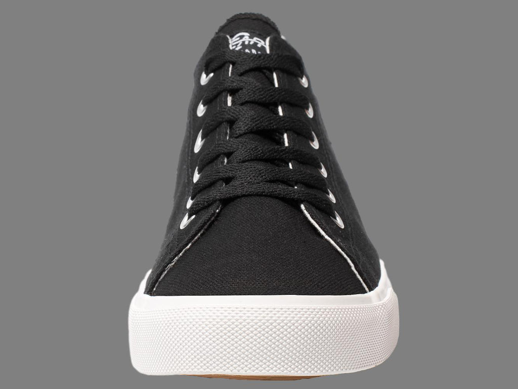 Black canvas low-top sneaker with lace-up front and white textured sole