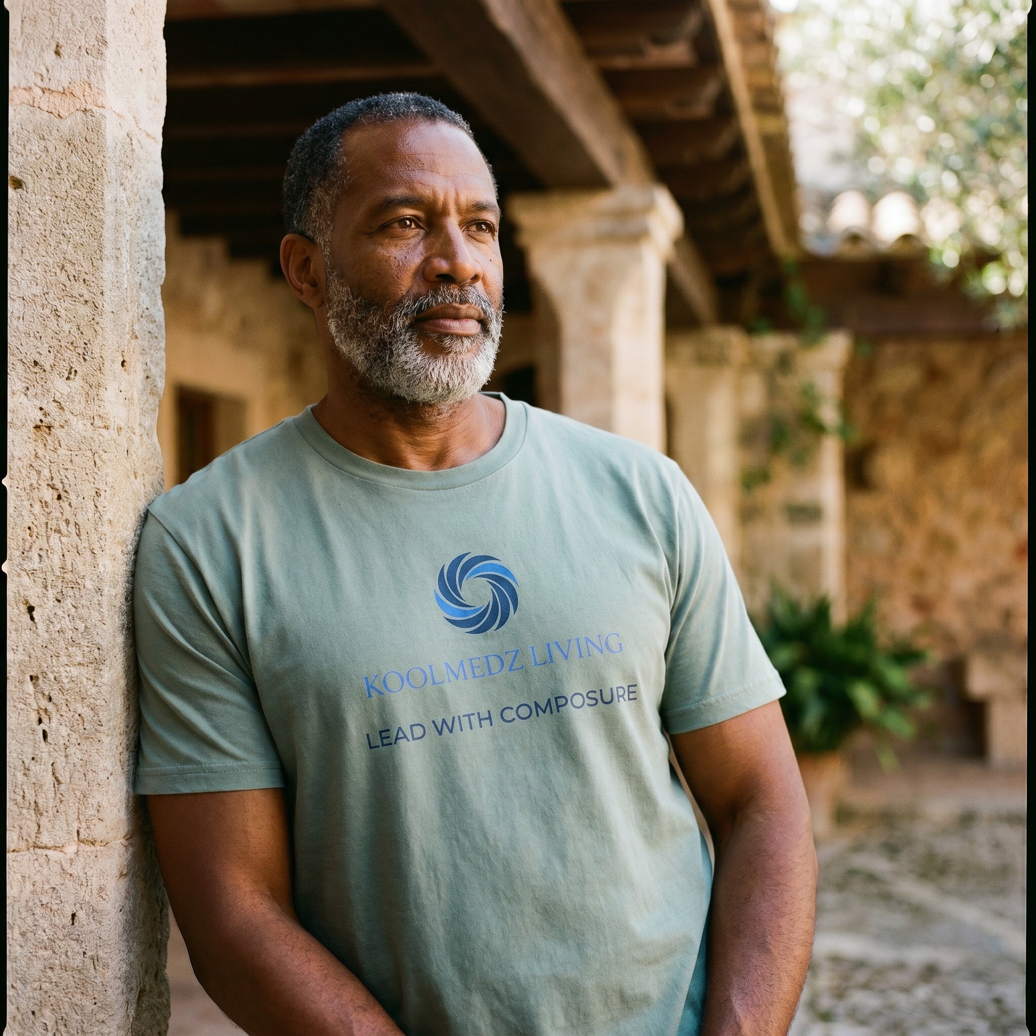 Unisex crewneck short-sleeve tee, dusty blue-green with front logo graphic
