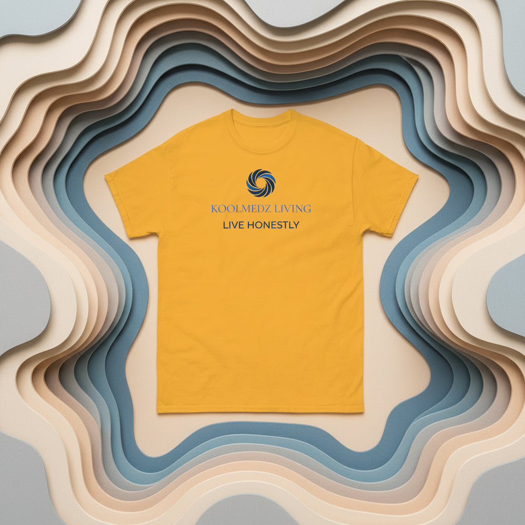 A yellow short-sleeve crewneck t-shirt with a blue and navy graphic on the chest reading 'KOOLMEDZ LIVING' and 'LIVE HONESTLY' with a swirl logo.