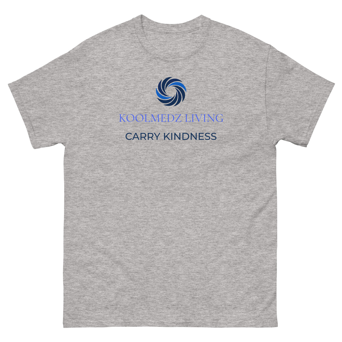 A heather gray short-sleeve crewneck t-shirt featuring a blue and navy graphic on the chest with the text 'KOOLMEDZ LIVING' and 'CARRY KINDNESS'.