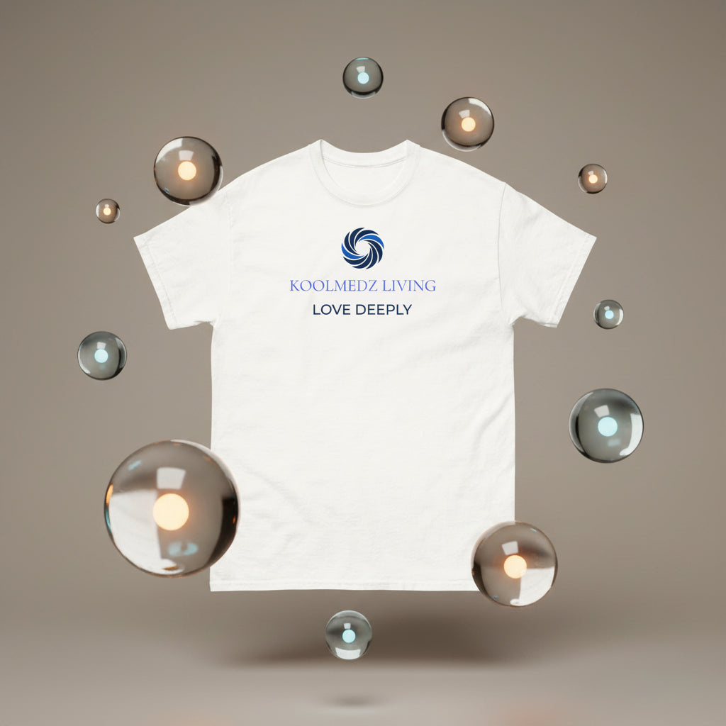 A white short-sleeve crewneck t-shirt with a blue circular logo and the text 'KOOLMEDZ LIVING' and 'LOVE DEEPLY' printed on the chest.