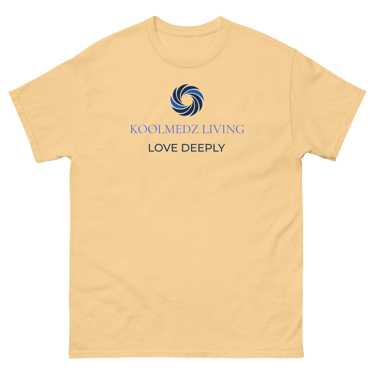 A light peach-beige short-sleeve t-shirt with a blue and navy graphic on the chest. The graphic features a circular swirl logo above the text 'KOOLMEDZ LIVING' in light blue and 'LOVE DEEPLY' in dark blue, displayed on a clean white background.