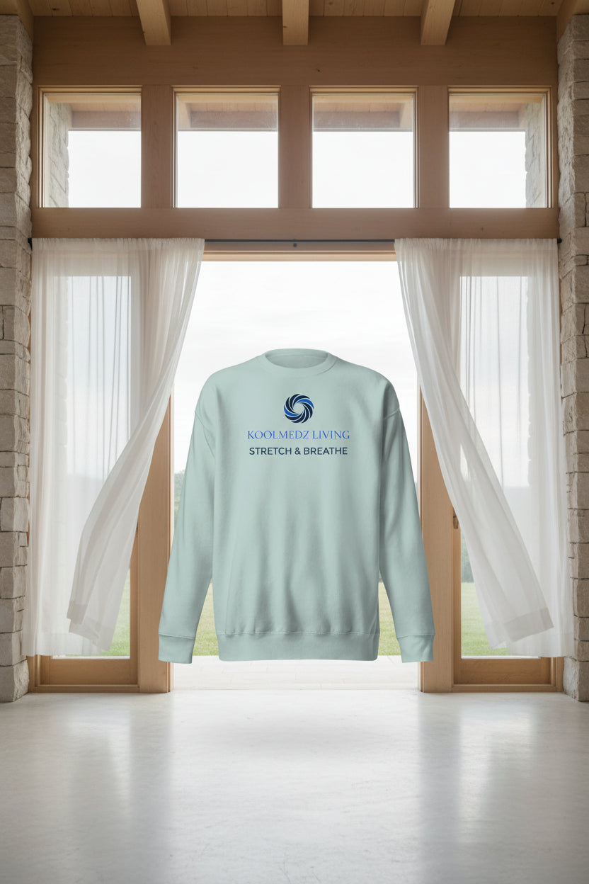 A mint green crewneck sweatshirt shown from both the front and back. 