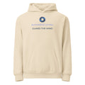 A cream-colored pullover hoodie with a front kangaroo pocket, featuring a blue and navy circular logo and the text 'KOOLMEDZ LIVING' and 'GUARD THE MIND' printed on the chest.