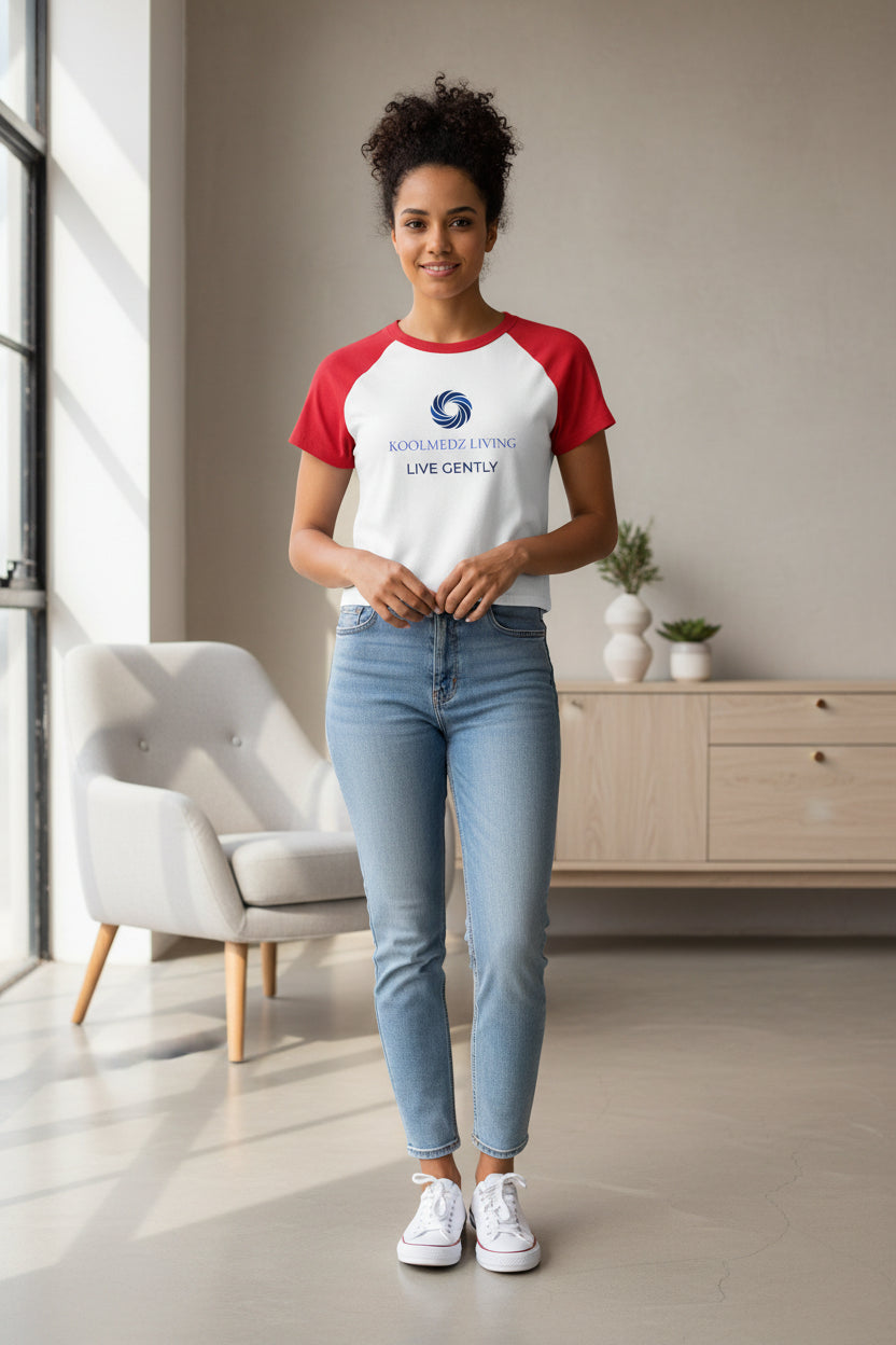 White raglan baby tee with red sleeves and front logo graphic